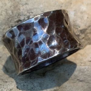 Abstract hammered and distressed ring.